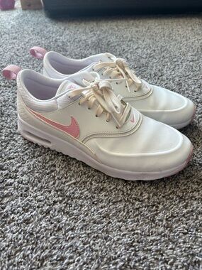 Nike Women’s White Sneakers with Pink Swoosh